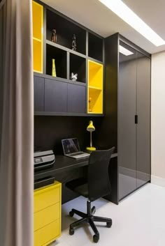 a home office with yellow and black furniture