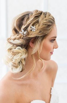 a woman with blonde hair wearing a wedding hairstyle