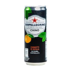 a can of san pellegrino chino with oranges and green leaves