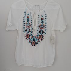 Light Weight Shirt. Breathable With Wonderful Embroidery On The Front. White Top. Super Cute. Has Beautiful Designs On The Front. Sheer Top. Casual Multicolor Tops With Geometric Embroidery, White Casual Tops With Geometric Embroidery, Casual White Tops With Geometric Embroidery, Casual Multicolor Embroidered Top With Short Sleeves, Casual White Blouse With Geometric Embroidery, Casual Short Sleeve Blouse With Multicolor Embroidery, Spring Short Sleeve Tops With Geometric Embroidery, Short Sleeve Tops With Geometric Embroidery For Spring, Casual Multicolor Embroidered Short Sleeve Top