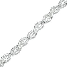 Proclaim your eternal love with this sparkling diamond infinity toggle bracelet. Crafted in sterling silver, this dazzling design features infinity symbol-shaped links that shimmer with ribbons lined with baguette-cut diamonds and ribbons lined with round diamond. Radiant with 1/2 ct. t.w. of diamonds and a brilliant buffed luster, this 7.25-inch bracelet secures with an infinity knot toggle clasp. Silver Infinity Diamond Bracelet For Formal Occasions, Silver Infinity Diamond Bracelet For Anniversary, Infinity Diamond Bracelet With Accents For Anniversary, Anniversary Diamond Bracelet With Infinity Design, Infinity Diamond Bracelet For Anniversary, Diamond Infinity Bracelet For Anniversary, Infinity Knot, Peoples Jewellers, Sparkling Diamond