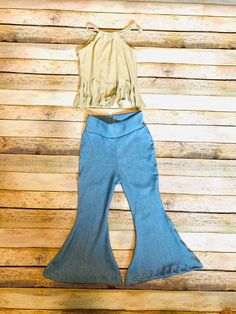 Angie Bells are made with beautiful stretchy denim. Comfortable and cute! Pair it with the fun and colorful Jane Crossed Back Top for a perfect retro chic look! Kids Bell Bottoms, 70s Style Clothing, Hippie Flare Pants, Baby Bell Bottoms, 70s Mode, Look Hippie Chic, Striped Flare Pants, Baby Halloween Outfits, Fringe Shirt