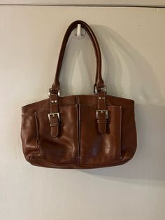 Very nice used Clarks Leather Handbag. Good condition. Brown Satchel Shoulder Bag With Silver-tone Hardware, Brown Bag With Silver-tone Hardware For Daily Use, Brown Travel Bags With Silver-tone Hardware, Brown Satchel With Silver-tone Hardware For Travel, Casual Rectangular Satchel With Silver-tone Hardware, Vintage Brown Bags With Silver-tone Hardware, Business Shoulder Bag In Tan With Silver-tone Hardware, Brown Shoulder Bag With Silver-tone Hardware For Everyday, Brown Hobo Bag With Silver-tone Hardware For Daily Use