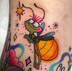 a close up of a person's leg with a cartoon character on it