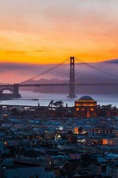 the golden gate bridge in san francisco, california at sunset as seen from baker's hill