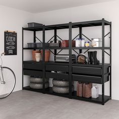 a bike is parked in front of a black shelf with baskets and other items on it