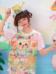 This T-shirt features a cute dog print on the front, with additional floral printed decorations on the sleeves and back, exuding a youthful and adorable vibe.  The price includes only one T-shirt.   	 		 			Size 			S 			M 		 		 			Length 			55 			58 		 		 			Bust 			102 			106 		 		 			Shoulders 			35 			36 		 		 			Sleeve Length 			22 			23 Harajuku Style Funny Print T-shirt For Spring, Spring Harajuku T-shirt With Funny Print, Playful Hello Kitty T-shirt For Summer, Sweet Cartoon Print Short Sleeve Tops, Multicolor Kawaii T-shirt For Spring, Spring Kawaii T-shirt With Funny Print, Sweet Pink T-shirt With Cartoon Print, Kawaii Character Print T-shirt For Spring, Hello Kitty Print Playful T-shirt For Summer