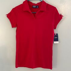 This New With Tags Izod Shirt In Red -Girls Size Xl/18-Has Cap Sleeves With Bows -Pictured/ Cotton And Polyester Blend. Originally $24 -Bundle With Other Items From The Closet For Greater Savings Or Make An Offer. Red Stretch Short Sleeve Shirt, Red Tops For School, Fitted Solid Color Tops For School, Red Collared Top For School, Solid Fitted Tops For School, Red Summer School Tops, Solid Color Summer School Tops, Red Summer Tops For School, Casual Stretch Tops For School