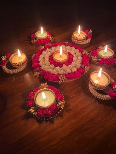 a bunch of candles that are sitting on a table