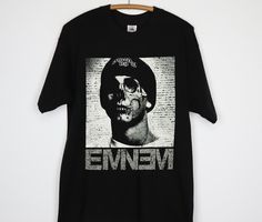 Eminem Skull Face Vintage Black T Shirt   Eminem Shirt   Shady Vintage Shirt   Gift For FanEminem Skull Face Vintage Black T Shirt   Eminem Shirt   Shady Vintage Shirt   Gift For Fan   This model reduces inventory waste and allows customers to create personalized designs. These t-shirts are made from high-quality materials and come in a range of sizes and colors, making them versatile for any occasion. Eminem Shirt, Skull Face, Black Skull, Vintage Shirt, Black T Shirt, Eminem, Vintage Shirts, Piece Of Clothing, Fashion Games