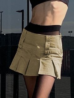 ⚡️Buy Wide Waist Pleated Mini Skirt Khaki S under $31.00 in Skirts Online. Style: Casual/Street/Sweet/Y2K/Preppy. Color: Khaki. Fabric Content: Polyester, Cotton. Fit Type: Regular fit. Length: Above Knee. Design: This skirt has a wide waistband with belt loops design, complete with concealed zip fastening alongside.. ✓Free Shipping on all orders over US$69.