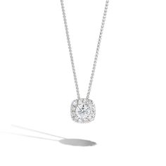 An elegant .25ct round cushion halo necklace showcasing .30ctw pave diamonds in the cushion halo. The pendant hangs on a beautiful 14K white gold dainty chain. Lab Grown Diamond Jewelry With Round Band, Dazzling Round Band Jewelry With Single Cut Diamonds, Dazzling Round Band With Single Cut Diamonds, Dazzling Jewelry With Single Cut Diamonds In Round Band, Dazzling Single Cut Diamond Jewelry With Round Band, Timeless Round Cut Halo Jewelry, Timeless Halo Design Round Cut Jewelry, Refined Single Cut Round Diamonds Jewelry, Timeless Yellow Gold Jewelry With Halo Setting