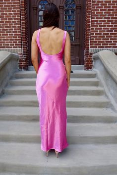 This maxi dress features a scoop neckline, sleeveless, open back, hidden side zipper closure, asymmetrical thread detail, satin material, and maxi length. 100% Polyester Hand Wash Cold. Do Not Bleach. Hang Dry. Iron Low. Madison is 5’8“ wearing a size Small.Model measurements:Bust: 32 in.Waist: 24 in.Hip: 34 In. Fitted Bias Cut Satin Maxi Dress, Satin Maxi Dress With Back Opening For Night Out, Satin Floor-length Maxi Dress With Ruched Back, Satin Maxi Dress With Side Slits For Night Out, Maxi Satin Dress With Back Opening For Prom, Maxi Length Satin Dress With Back Opening For Prom, Chic Bias Cut Maxi Dress For Prom Season, Satin Maxi Dress With Side Slits For Party, Party Satin Maxi Dress With Side Slits