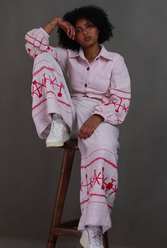 Introducing the ‘Habesha Harmony: Embroidered Women’s Top and Trouser Duo’, a captivating fusion of tradition and fashion that elevates Habesha fashion and design to another level. Crafted from modern Habesha cloth, this set features intricate embroidery inspired by Habesha culture, adding a touch of Ethiopian heritage to your wardrobe. The high-quality fabric ensures comfort and style, making it suitable for any event and office use. Whether you’re attending a cultural event or simply appreciat Designer Wear Sets With Embroidered Sleeves For Navratri, Festive Fitted Palazzo Set With Embroidered Sleeves, Traditional Palazzo Set With Embroidered Sleeves, Embroidered Long Sleeve Pant Set For Designer Wear, Traditional Fitted Palazzo Set With Straight Pants, Traditional Fitted Palazzo Set With Embroidered Sleeves, Traditional Pant Set With Resham Embroidery, Spring Traditional Palazzo Set With Embroidered Sleeves, Traditional Embroidered Sets With Straight Pants