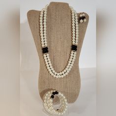 This Listing Is For A 3-Piece Jewelry Set. The Set Consists Of A Double Strand White Pearl And Black Pearl Necklace With Rhinestone Accents - 23.5” A 3 Coil Wrap Bracelet - White Pearls, Black Pearls, And Rhinestones - 6.5” Drop Earrings- 1.5” White And Black Pearls Elegant Festive Classic Bridal Stylish Sophisticated Vintage-Like Victorian Modest Handmade By Me. New Pearl Necklace Set Elegant Formal Jewelry With Black Beads, Elegant Black Beaded Jewelry For Formal Occasions, Elegant Black Beaded Jewelry, Elegant Formal Black Beaded Jewelry, Elegant Black Beads Jewelry For Evening, Elegant Black Beaded Jewelry For Evening, Elegant Black Beaded Evening Jewelry, Elegant Black Adjustable Jewelry Sets, Classic Beaded Jewelry For Party