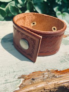 ✨ Hand tooled from 8oz vegan tan leather. ✨All snaps, rivets and conchos are nickel free and rust proof.  ✨ Width of cuff is approximately 1 1/2 in. wide. ✨ SIZING: measurement between snaps is approximately 8 in.   When clasped, bracelet measures approximately 8 1/2 in. in circumference. Leather Cuffs Bracelet, Western Jewelry, Leather Cuffs, Rose Design, Tan Leather, Leather Handmade, Cuff Bracelet, Vegan Leather, Leather Bracelet