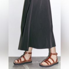 Fisherman Sandals In Leather. Flatform Lug Sole. Buckled Ankle Strap Closure. Brown. Size 6.5, 10. New With Tags. Rare. Sold Out Everywhere. @Zaraforadolla Note: This Item Runs Large. Brown | 1601/210 Upper 100% Cow Leather Lining 100% Goat Leather Sole 100% Rubber Insole 100% Styrene Butadiene Rubber Brown Footbed Sandals With Single Toe Strap For Spring, Summer Closed Toe Footbed Sandals With Heel Strap, Spring Brown T-strap Sandals With Leather Footbed, Brown T-strap Sandals With Leather Footbed For Spring, Leather T-strap Sandals With Ankle Strap For Summer, Spring Brown Leather Footbed Sandals, Brown Leather T-strap Sandals For Spring, Medium Width Leather T-strap Sandals For Spring, Brown Footbed Sandals With Single Toe Strap For Summer