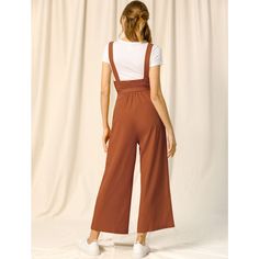 Show your casual laid-back vibes in this cute straight-fit overall jumpsuit. This woven overall jumpsuit features a low square neckline, shoulder straps, a partial button-front placket, a removable self-tie at the waist, a wide leg, and a relaxed silhouette. Soft fabric makes this overall jumpsuit comfortable to wear. It makes you beautiful with fashion and classic design and makes you stand out in the crowd. This loose-fit overall jumpsuit suit is for most ladies, you can pair it with a T-shirt Jumpsuit Suit, Long Overalls, Belted Jumpsuit, Overall Jumpsuit, Belt Jumpsuit, Leg Belt, Makes You Beautiful, Square Neckline, Jumpsuits For Women