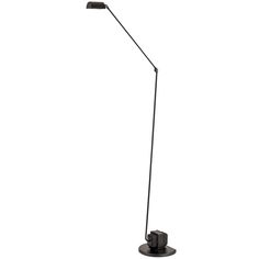 a black floor lamp on a white background with the light turned on and dimming