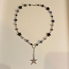 blue and black star spiral necklace! 🌀 Spiral Star, Pearl Jewlery, Charm Necklace Diy, Diy Beaded Rings, Blue Spiral, Spiral Necklace, Nail Jewels, Instagram Jewelry, Nail Jewelry