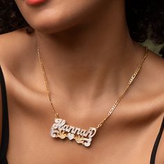 Our popular Double Plated Love Bird Name Necklace boasts a chic and elegant design, handcrafted to perfection. The model showcases the necklace with an 18-inch Cuban chain (see video for reference). You can personalize this item with Letters, Numbers, and Roman Numerals and choose from chain lengths of 14", 16", 18", and 20". Each chain features a lobster clasp closure for secure wear.Chain width:Cuban Chain - 3.7 mmFigaro Chain - 3 mmXO Chain - 5 mm Xo Chain, Holiday Gift Guide Kids, Name Plate Necklace, Dainty Initial Necklace, Ring Bracelet Chain, Name Earrings, Engraved Pendant, Love Bird, Photo Pendant