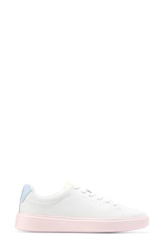 This sleek leather sneaker with clean lines inspired by classic tennis styles has rubber caps at the toe and heel for added traction. Round toe Lace-up style Removable cushioned footbed Leather upper/textile lining/synthetic and rubber sole Imported White Tennis Sneakers With Contrast Sole, Sporty Low-top Platform Sneakers With Rubber Toe Cap, White Low-top Platform Sneakers With Rubber Heel Cap, Spring Tennis Lace-up Sneakers, Sporty Synthetic Sneakers With Rubber Heel Cap, Sporty Sneakers With Rubber Heel Cap And Synthetic Material, Sporty White Platform Sneakers With Rubber Heel Cap, Spring Tennis Low-top Sneakers, Leather Low-top Skate Shoes With Rubber Toe Cap