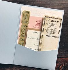 an open book with some stamps in it