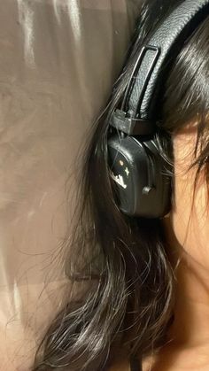 a close up of a person wearing headphones