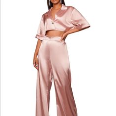 Light Pink Satin Crop And Pant Set. Never Worn Solid Cropped Bottoms For Night Out, Elegant Two-piece Bottoms For Spring, Chic Pink Two-piece Bottoms, Satin Pants For Summer Night Out, Spring Evening Cropped Bottoms, Summer Satin Wide Leg Pants For Night Out, Summer Wide Leg Satin Pants For Night Out, Elegant Cropped Bottoms For Date Night, Spring Evening Sets With High-waisted Pants