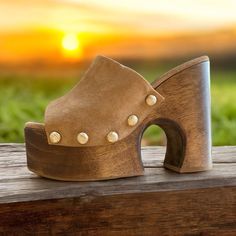 The Cult Gaia Joplin Platform Sandal Is A Heeled Sandal With A 5.5” Heel And A 2.25” Platform. It Is Made From Soft Brown Suede And Has A Tonal Wooden Base. The Sandal Is Made From Genuine Leather, Suede, And Rubber. Size Type: Regular Style: Slide Sandal Width: Regular Color: Camel Pattern: Solid Occasion: Casual Details: Padded Heel Type: Sculpted Heel Height: 5” Toe Type: Square Insole Material: Wood Lining Material: Leather Outsole Material: Rubber Upper Material: Suede Care Instructions: Sp Brown Leather Platform Slippers For Beach, Summer Suede Open Toe Platform Slippers, Suede Platform Slip-on Sandals, Brown Lace-up Platform Sandals With Round Toe, Leather Platform Slippers With Deep Heel Cup, Open Toe, Heeled Sandal, Cult Gaia, The Cult, Soft Brown