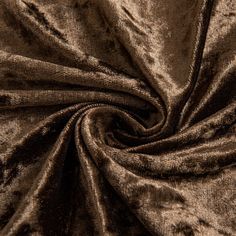 a close up view of a brown velvet fabric