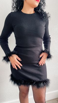 Details: Dress features round neckline, long sleeve, feather cuff and hem, rib knit and mini length. 52% Viscose, 29% Polyester, 19% Nylon Hand wash cold Color: Black True to size fit Model is wearing a size medium Measurements:Measurements are approximate Small: Bust 32-34” | Waist 25-26” | Hips 38-39"Medium: Bust 35-36" | Waist 27-28” | Hips 40-41"Large: Bust 38-40" | Waist 29-30”| Hips 42-44" Long Sleeve Sweater Dress For Winter Party, Crew Neck Mini Dress For Night Out In Fall, Fitted Winter Mini Dress With Feather Trim, Winter Mini Dress With Feather Trim, Ribbed Mini Dress For Winter Party, Fall Mini Dress With Feather Trim, Winter Black Mini Dress With Feather Trim, Long Sleeve Winter Dress With Ribbed Cuffs, Winter Long Sleeve Dress With Ribbed Cuffs