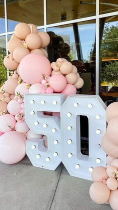 balloons are arranged in the shape of letters and numbers