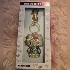 the hello kitty key chain is in its box