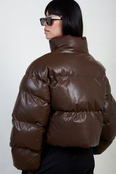 - Fit: True to size- Materials: 100% polyester- Thickness: Thick- Sheerness: None- Stretch: None- Lining: Full- Care: Gentle wash cold and dry in shade Brown Down Puffer Jacket For Winter, Brown Down Winter Puffer Jacket, Brown Down Puffer Jacket With Padded Collar, Brown Puffer Outerwear For Cold Weather, Brown Down Outerwear For Fall, Leather Puffer Jacket With Zipper For Fall, Fall Leather Puffer Jacket With Zipper, Fall Nylon Puffer Jacket With Padded Collar, Brown Puffer Outerwear For Fall