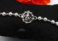 Metal-925 sterling silver. Item type-Rakhi Bracelet. Length-6 inches.to 9 inches (select you size from option ) Weight-6.200 grams.(weight will be vary as per length) Center piece size-1.8cm beads size-3 to 5 mm approx. Stamped-925. Thank You and Happy Shopping! Adjustable Sterling Silver Bracelets For Diwali, Silver Beaded Bracelets With Round Beads For Festivals, Silver Fusion Bracelets For Diwali, Spiritual Silver Bracelets For Diwali, Sterling Silver Bracelets With Silver Beads For Festive Occasions, Festive Sterling Silver Bracelets With Silver Beads, Symbolic Sterling Silver Bracelets For Festivals, Sterling Silver Bracelets For Festivals, Silver Hand-strung Jewelry For Festivals