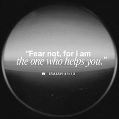 a black and white photo with a bible verse on the bottom right hand corner, in front of a dark background