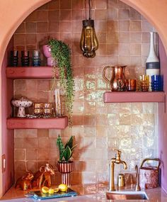 a kitchen with shelves filled with pots and pans