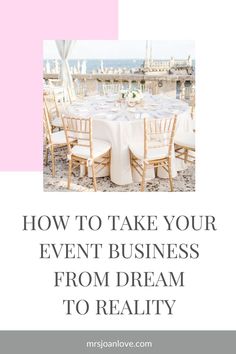 a table set up with white linens and chairs for an event