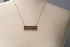 "{  S T R E N G T H  } Be brave. Be bold. Be unafraid. I created these reversible necklaces to express the virtues I strive to live my life by. With one side in Braille + the other in a sweet, handwritten script, its up to you which side you display. Let this necklace be a tiny reminder of the values that inspire you, that you hold true + dear to your heart.  { item description } Your necklace will arrive packaged on a custom Braille-typed + laser-engraved steel-gray card with accompanying text Braille Necklace, Divine Providence, Petite Necklace, Live My Life, The Virtues, Silver Paint, Modern Necklaces, Silver Box, Box Chain