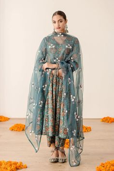 Introducing this exquisite Pure Cotton Green Floral Printed Anarkali Suit Set - the perfect choice for creating a sublimely stylish look. Expertly crafted from cotton, its delightful floral print sets it apart as a truly luxurious piece for summer evenings and garden parties. Comfortably flattering, it makes a timelessly tasteful style statement. No. of set : 3 pieces Color : Green multicolor Fabric : Pure Cotton Kurta Length : 40 inches Pant Length : 38 inches Washing Instructions : Dry Clean Transitional Anarkali Palazzo Set With Floral Embroidery, Festive Anarkali Palazzo Set With Floral Embroidery, Bollywood Style Floral Print Sharara For Eid, Bollywood Floral Sharara For Eid, Bollywood Style Anarkali Set With Printed Motifs For Wedding, Wedding Anarkali Set With Printed Motifs For Navratri, Diwali Cotton Silk Kurta With Floral Print, Anarkali Palazzo Set With Floral Print And Traditional Drape, Diwali Cotton Silk Floral Print Kurta