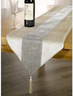 PRICES MAY VARY. 100% Polyester. Coloured table runner with diamante strip. Tassel detail on each end. Size (approx): 185cm x 32cm. Coloured table runner with diamante strip. Tassel detail on each end. Size (approx): 185cm x 32cm. 100% Polyester. Chandelier Quilts, Glam Dining Room, Table Runners Patterns, Round Marble Dining Table, Patchwork Table Runner, Sequin Table Runner, Table Runner Size, Quilted Table Runners Patterns, Marble Furniture