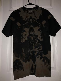 This tee looks like a Rorschach Test. It's so sick, and when you look at it you could see many different things, a religious symbol, a skeleton, a demon, so many different ways to look at it! 50% Cotton 50% Polyester Size: L Fit: to size Brand: Jerzees Made in Honduras Rorschach Test, Black Tee Shirt, Religious Symbols, A Skeleton, Honduras, Black Tee, Tee Shirt, Gender Neutral, That Look