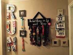 there are many different items on the wall in this room that is decorated with license plates and magnets