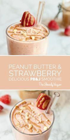 peanut butter and strawberry milkshake in two glasses with strawberries on the side