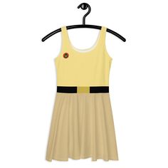 We're ready for adventure with this super cute scout dress that evokes Russel with khaki bottom, yellow top, and belt. This super comfortable running dress will look great during any race. Designed for Spring Suprise 2024, all you need to do is add an orange scarf and sash. We also have the scout uniform dress with the sash!  Easy to wear, and comfortable to run in, this tank dress is perfect for race costumes or every day wear. I am 5'2" and 170 pounds and a large was quite comfortable, but I could have easily worn a medium for Wine & Dine. For Princess, I wore a medium dress and it fit perfectly. * Good stretch for comfortable fit * Mid-thigh length--looks great with or without crinoline * Moisture wicking Due to the nature of printing and sewing the pieces together, the corner of the sa