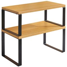 a wooden table with metal legs and a shelf on the top that has two shelves