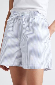 Add a perfectly preppy element to your look with these pinstripe shorts in crisp, lightweight cotton. 8 1/2" inseam; 26" leg opening; 12" front rise; 15 1/2" back rise (size 36) Elastic/drawstring waist Front slant pockets 100% cotton Machine wash, line dry Imported Striped Shorts For Daywear, Cotton Relaxed Fit Shorts With Vertical Stripes, Striped Relaxed Fit Shorts For Daywear, Spring Bottoms With Contrast Stripes, Short Bottoms With Contrast Stripes For Spring, Striped Shorts For Spring Daywear, Striped Shorts For Daywear In Spring, Spring Striped Shorts For Daywear, White Cotton Shorts With Vertical Stripes