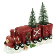 a red train with christmas decorations on it