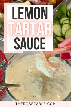 a person dipping sauce into a bowl with vegetables in the background and text overlay that reads lemon tartar sauce